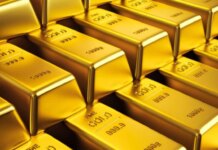 Золото держится около 5000 долларов – рынки ждут сигналов от ФРС